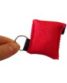 Disposable CPR facial shield with valve, in mini-pouch with key ring.