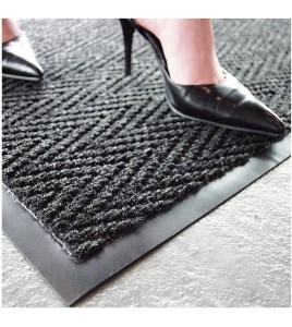 Chevron entrance carpet, 5/16 in made of charcoal gray polypropylene.