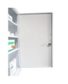 Wall-mounted metal first aid cabinet with solid door panel and lock with 2 keys.