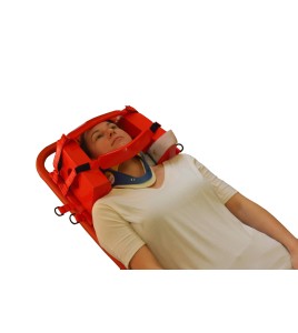 Head immobilizer with straps and foam blocks.