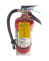 Yellow plastic monthly inspection tag for fire extinguishers, labelling in French, covering 4 years.