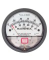 Magnehelic S2000 pressure gauge with scale from 0 to 0.25 inches of water (0 to 60 Pa), to indicate differential pressure