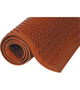 Red carpet 1/2 in, made of vulcanized rubber with cylindrical flow openings and rising grooves.